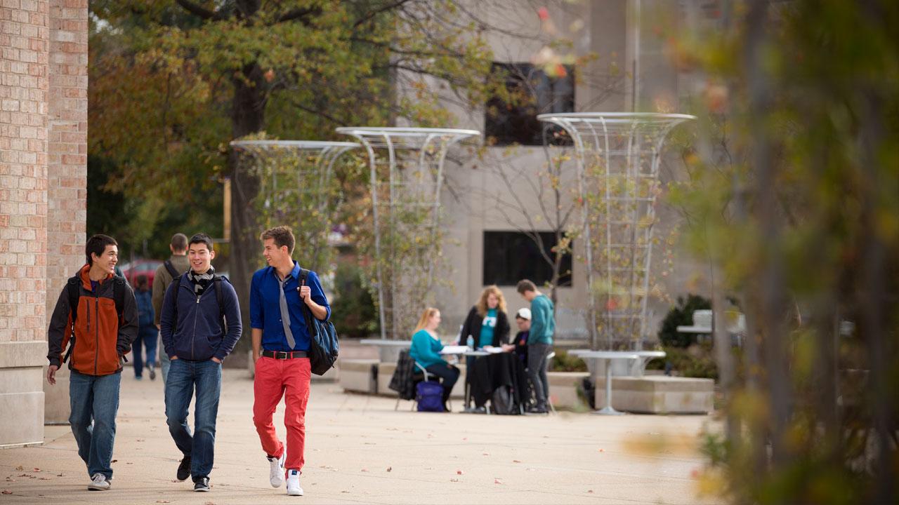 Three students walking to class
